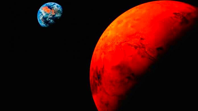 Photo An artists rendition of Mars in proximity to Earth  Getty Images